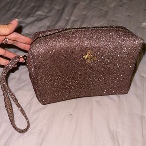Glittery bronze cosmetic bag